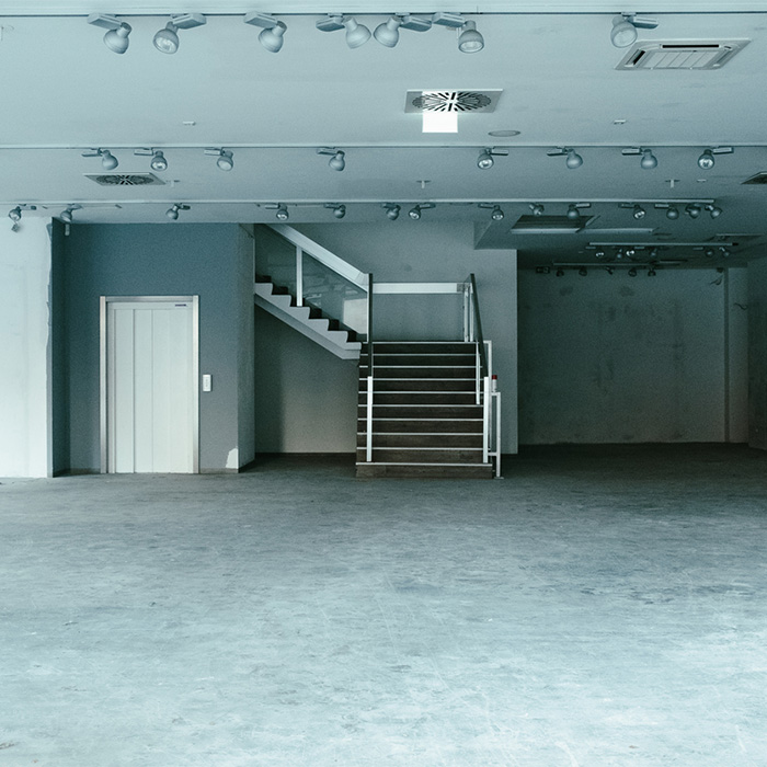 an empty retail store just finished using a junk haul away junk removal company