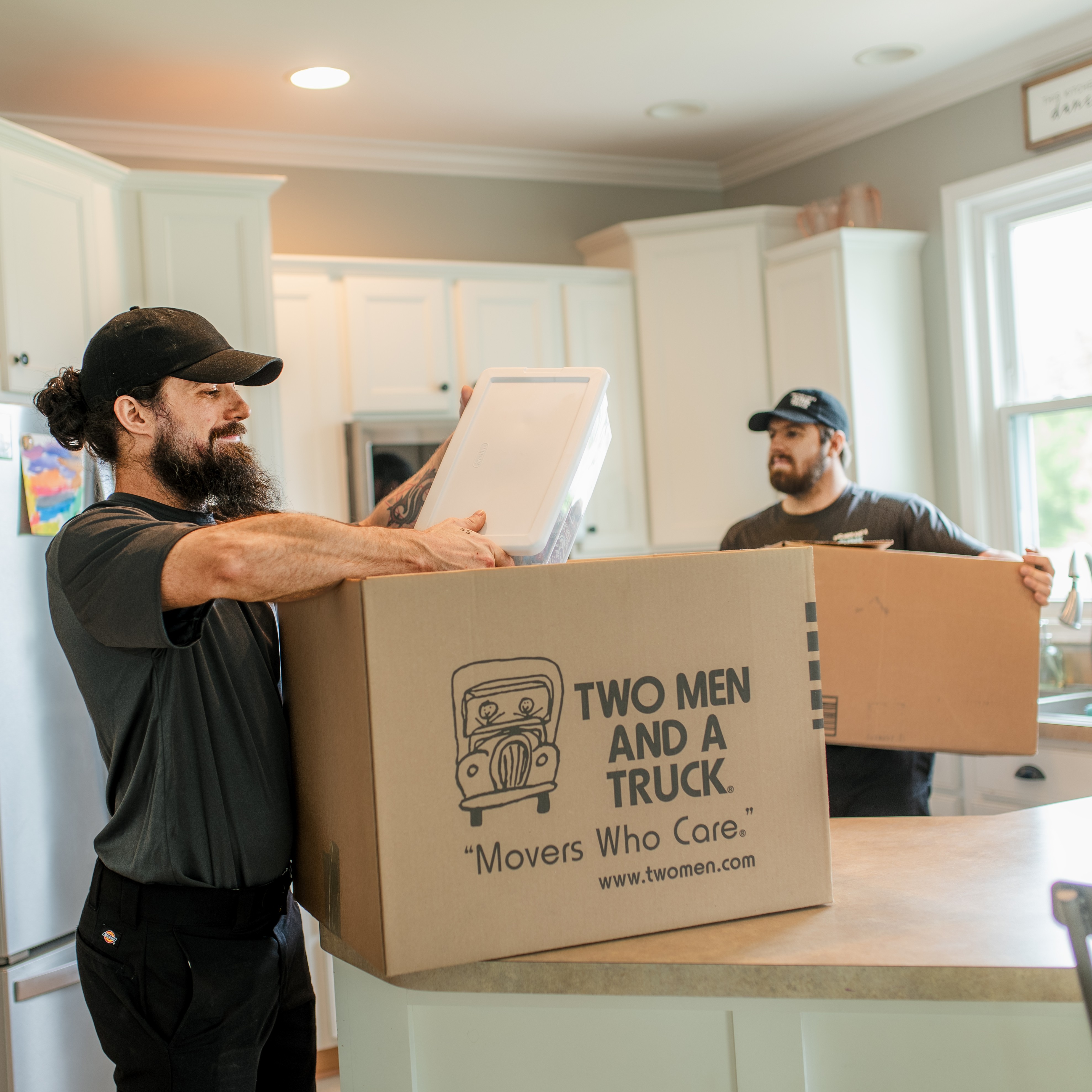 Junk Haulers using TWO MEN AND A TRUCK boxes