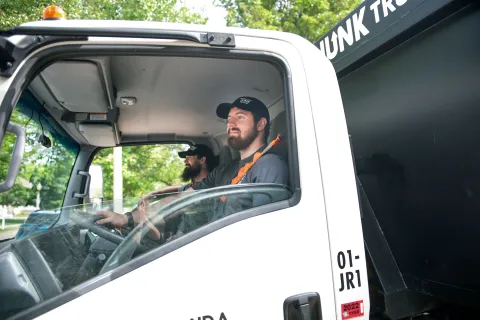 Team Members driving truck