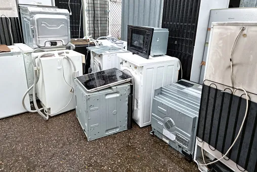 Many old appliances no longer being used and taking up space in a room