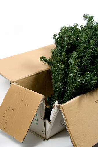 An old and worn out artificial Christmas tree 