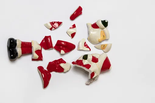 A broken Santa Christmas ornament