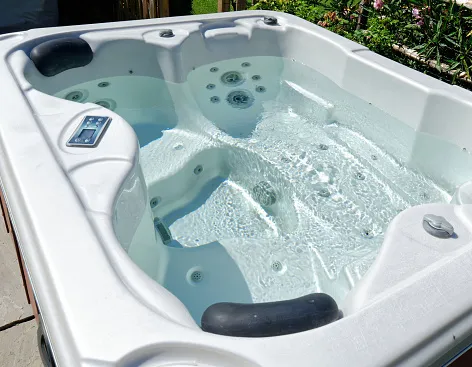 An older hot tub that needs to be hauled away to create space for opportunity