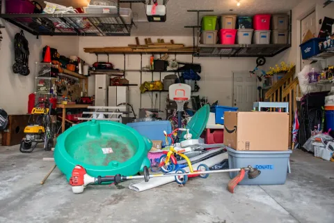 items sitting needing a garage cleanout waiting on junk removal services company to show up