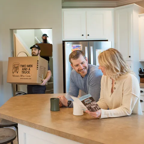 happy customers discussing their satisfaction with their received junk removal services