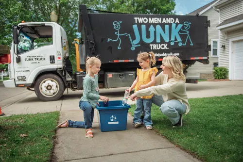 family outside preparing recyclables for recycle week