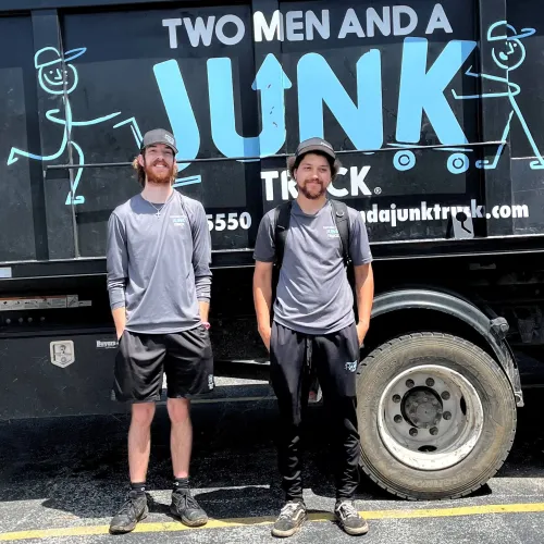 Team Members in front of Quad Cities Truck