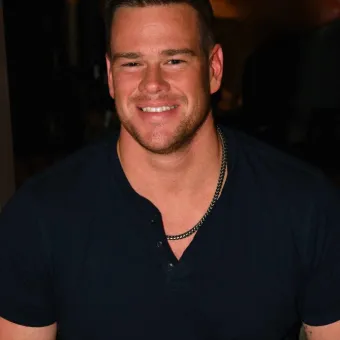 Garrett, general manager, smiling