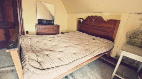 an old, beat-up mattress past its prime