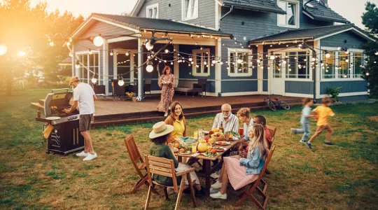 A family enjoying their clean and organized backyard space