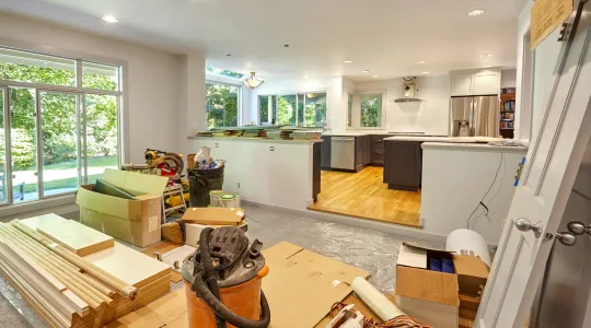 Home remodeling supplies fill a living room