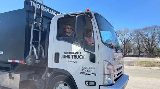 two men and a junk truck top choice for affordable junk removal in peoria